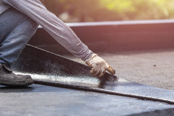 Professional Waterproofing technician working in Hempstead, NY
